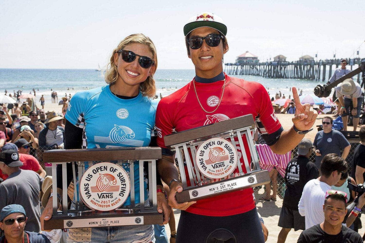 Californians Kanoa Igarashi (USA) and Sage Erickson (USA) celebrate their wins at the Vans US Open of Surfing. Credit: © WSL / Morris