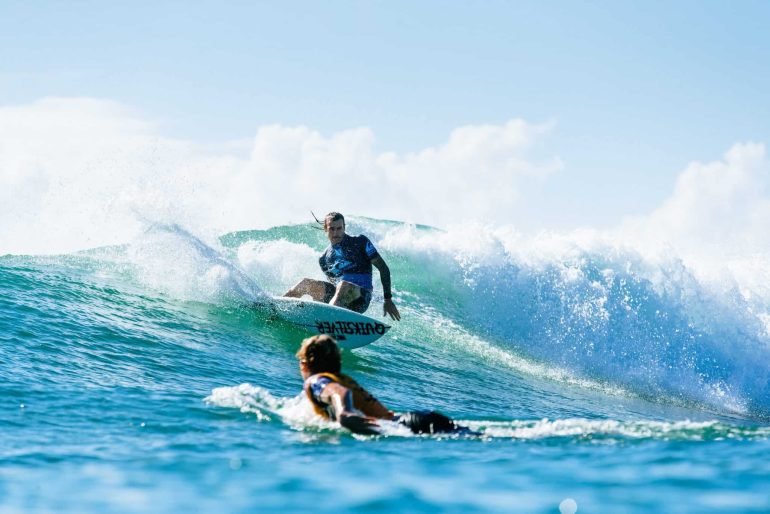 Quiksilver Pro Gold Coast wildcard Mikey Wright (AUS) surfs past 2x WSL Champion and current World No. 1, John John Florence (HAW), in the opening elimination heat of Round 1. Caption: © WSL / Sloane