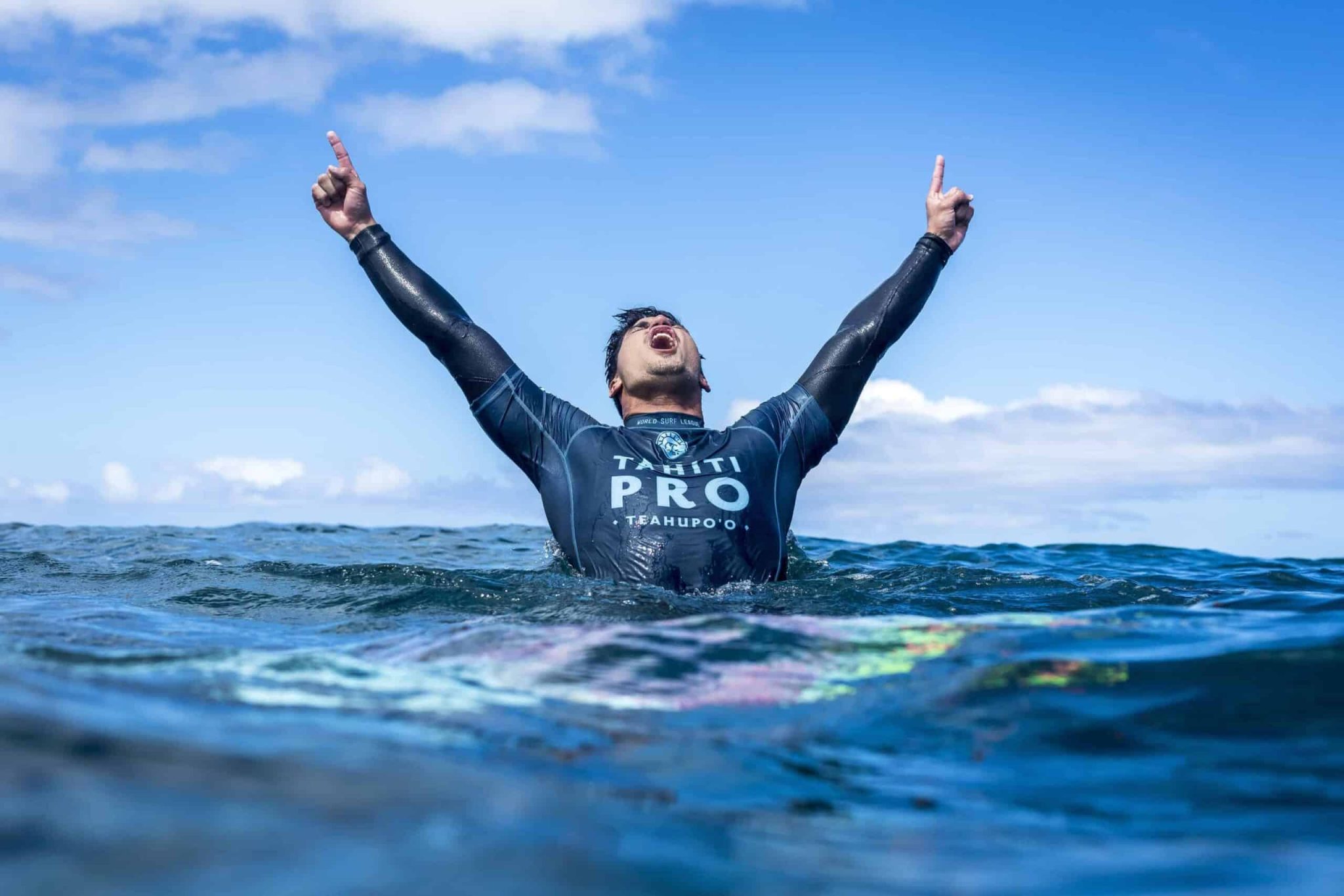 Caption: 2014 WSL Champion Gabriel Medina (BRA) celebrates his win at the Tahiti Pro Teahupo'o. Credit: © WSL / Poullenot